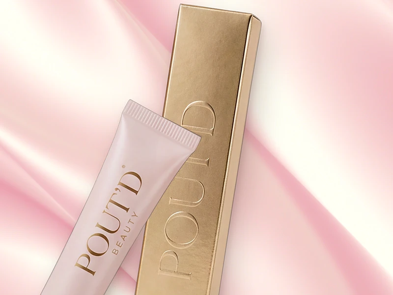 Pout'd lip plumper for a fuller-looking pout, shown on blush silk